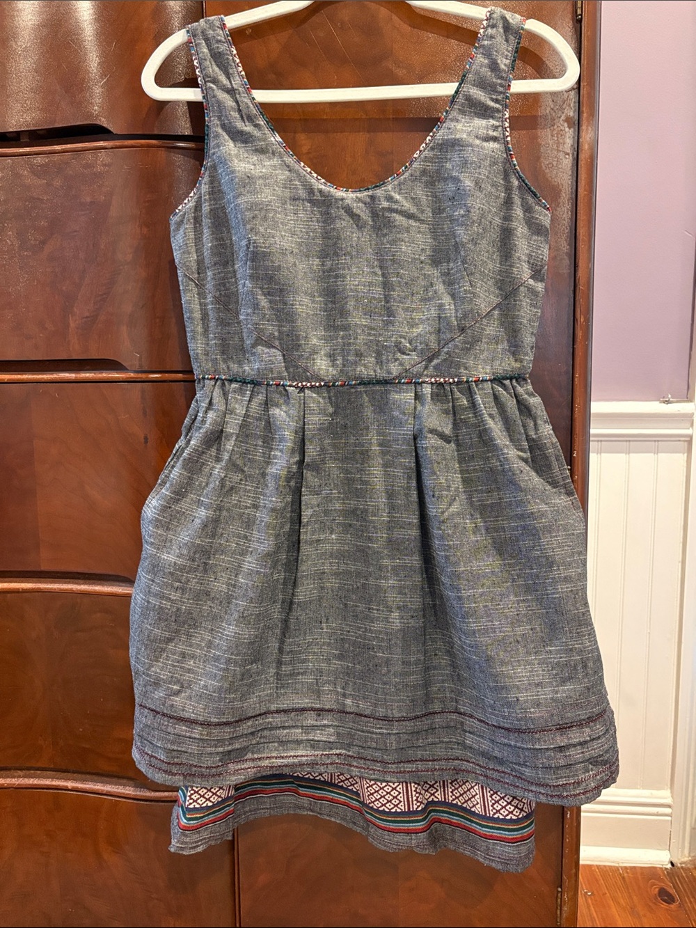 Women’s Sleeveless Gray Chambray Dress with Embroidered Hem